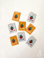 Minki Kim Made With Love Woven Labels Featuring Strawberries; Set of 8 Labels, Double Sided & Machine Washable; Approx. 1" x 1.25" each