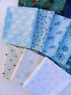 Winter Mix Fat Quarter Bundle with pieces from Lori Holt and Heather Peterson; 15 piece bundle, approx. 18" x 21" each