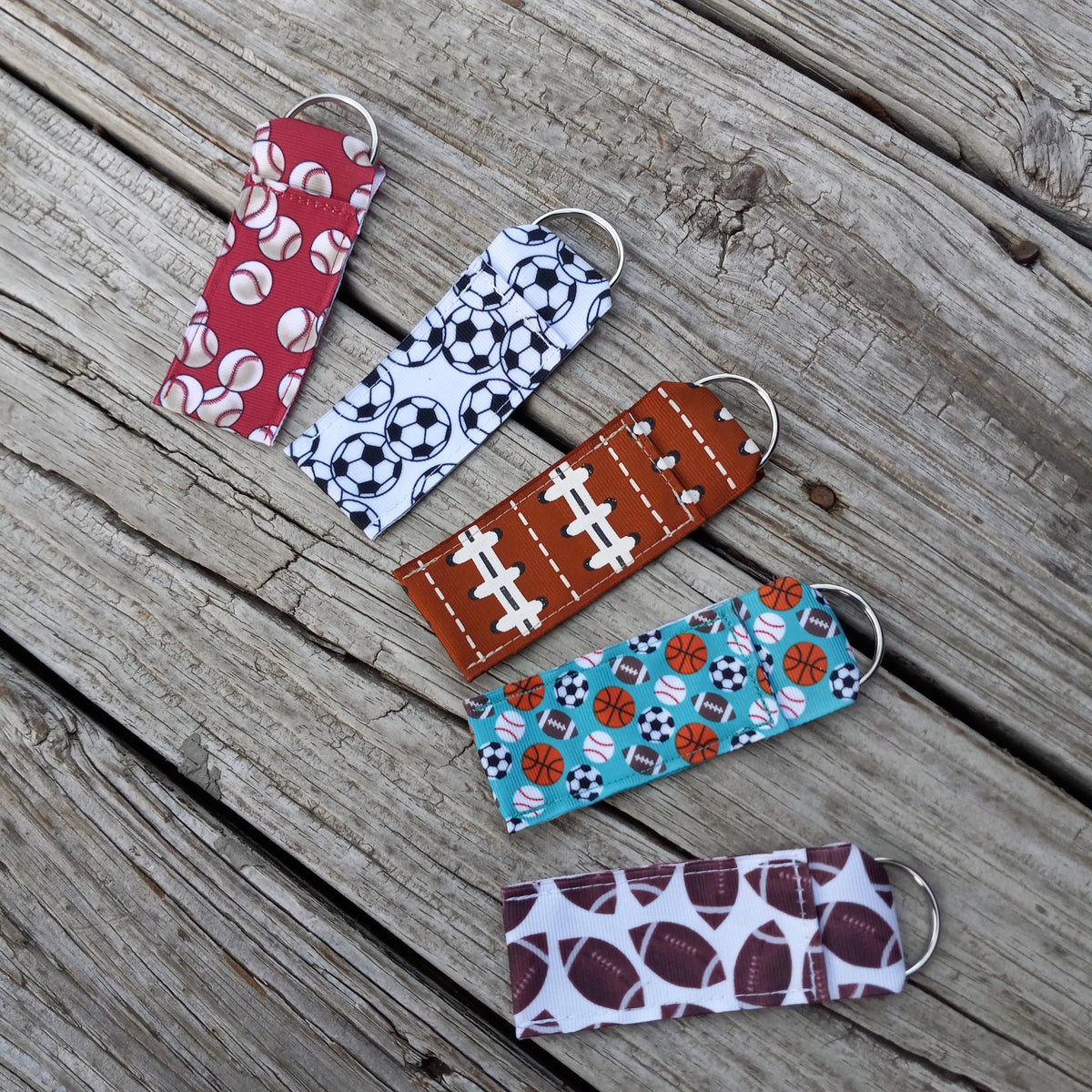 Sports Fan Chapstick Holders featuring baseball, soccer, football, basketball