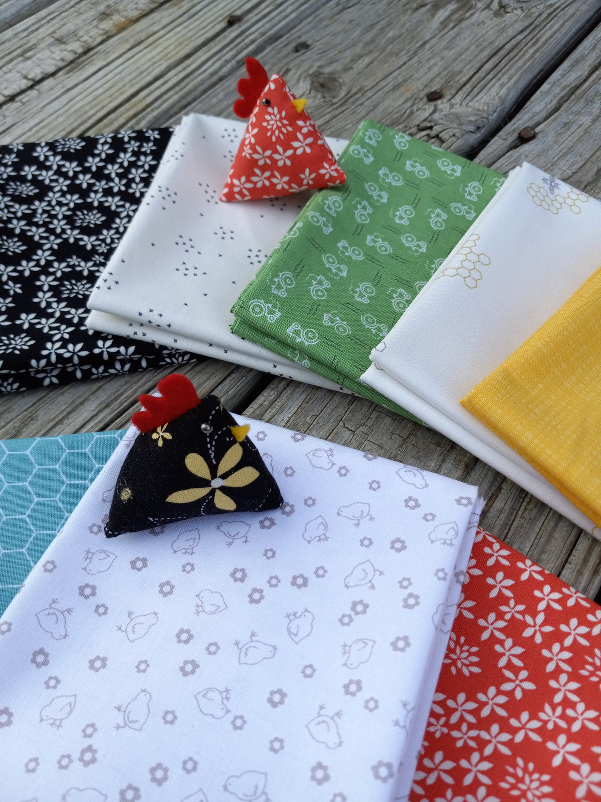 The Lil' Farm Fat Quarter Bundle ft. lil' tractors, chicks, honey bees, and chicken wire prints; 8 piece fabric bundle