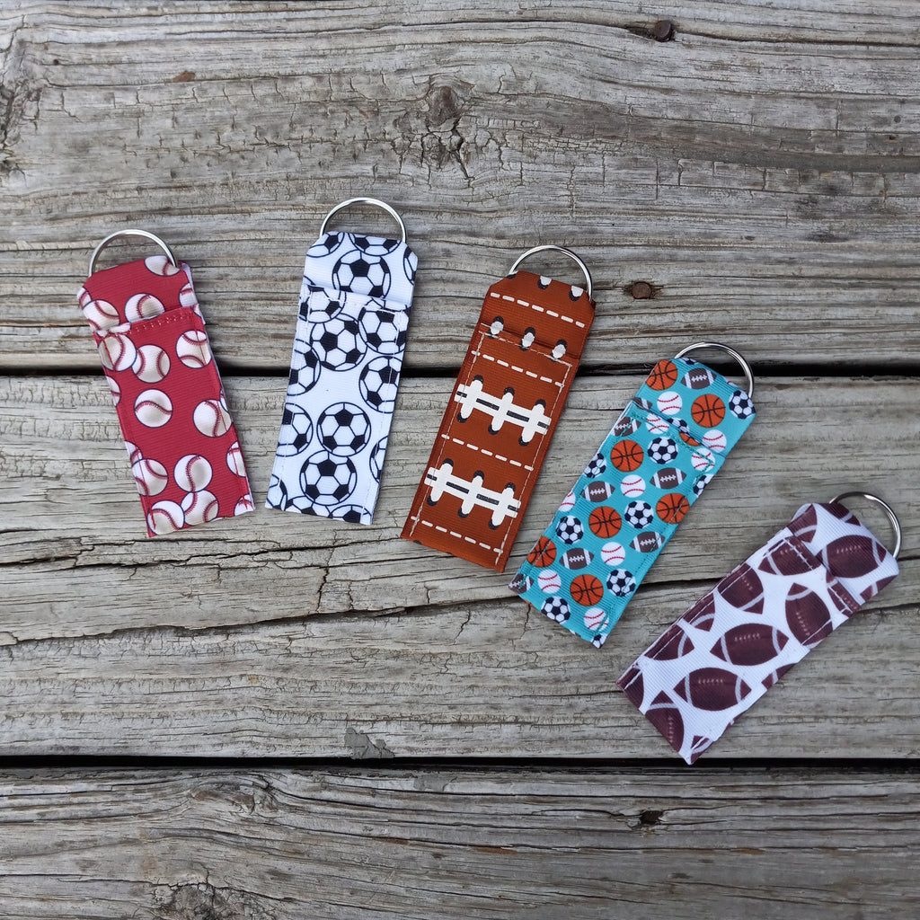 Sports Fan Chapstick Holders featuring baseball, soccer, football, basketball