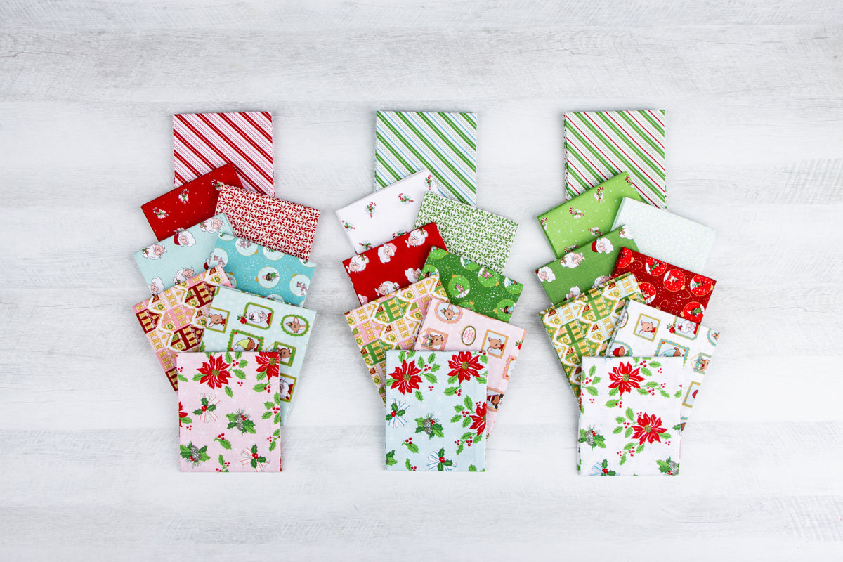 Claus & Co. Santa Heads on Red by Melissa Mortenson; Sold in Half Yard Increments
