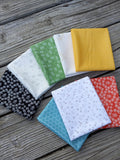 The Lil' Farm Fat Quarter Bundle ft. lil' tractors, chicks, honey bees, and chicken wire prints; 8 piece fabric bundle