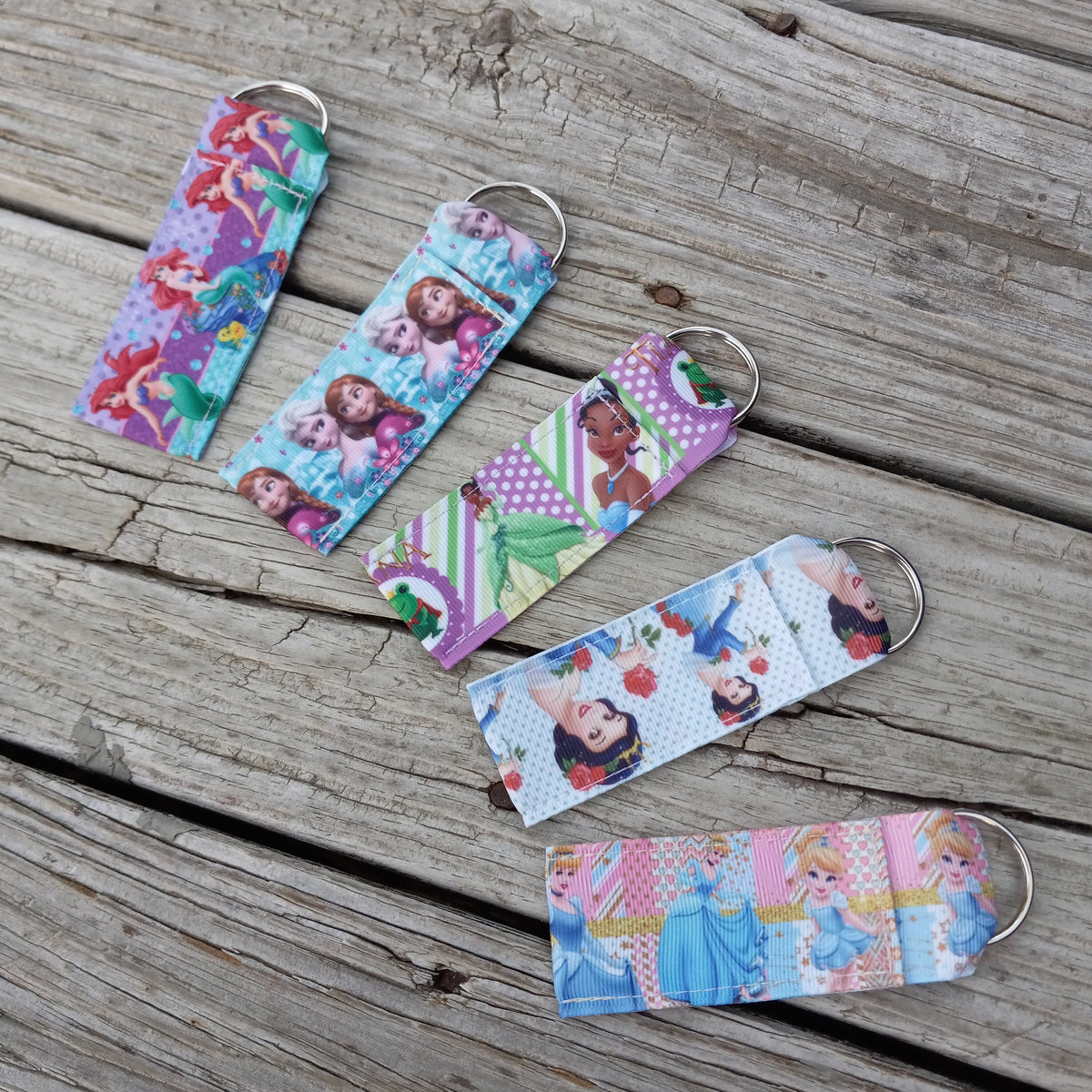 Disney Princess Chapstick Holders featuring Ariel, Elsa & Ana, Tiana, Snow White, and Cinderella